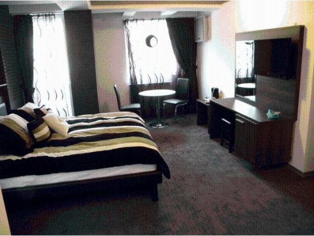 Duvet Center Hotel Szkopje Szoba fotó