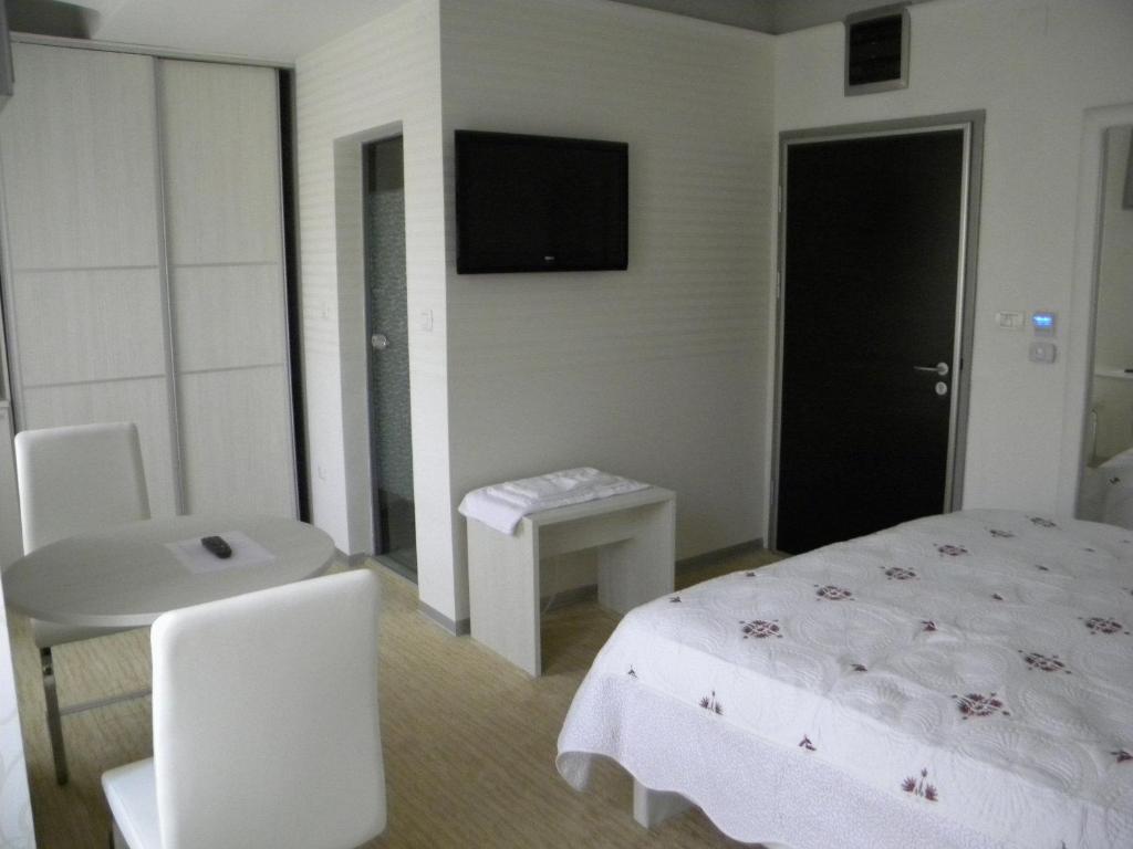 Duvet Center Hotel Szkopje Szoba fotó
